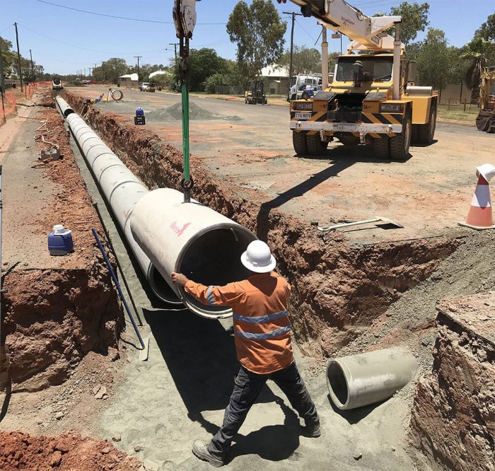 Pipe being laid into position